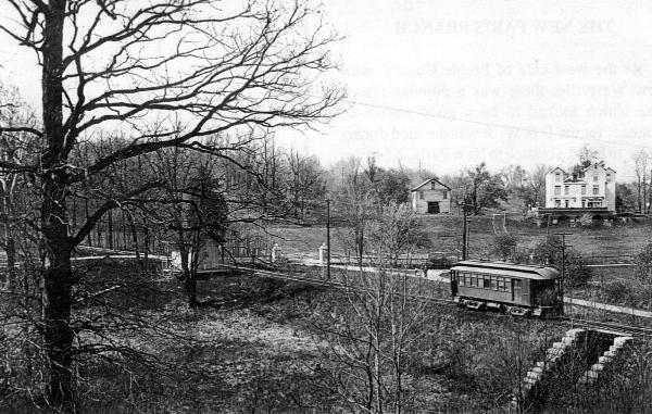 Historic photo of a Dayton & Western car having just passed the Cedar Springs stop