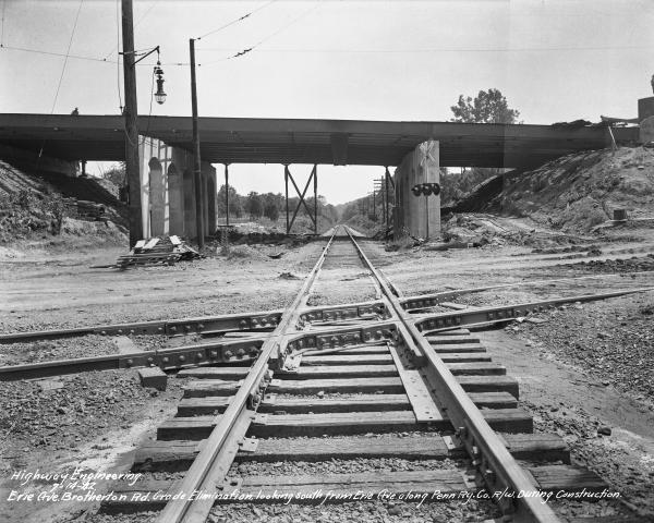 Historic photo of the PRR Richmond Division tracks intersecting with Erie Avenue streetcar tracks at the border between East Hyde Park and Madisonville