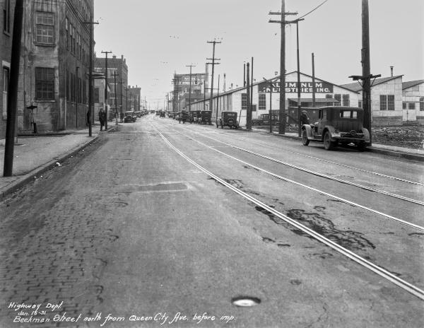 Historic photo of the Cincinnati & Westwood and CH&D Railroads crossing streetcar tracks on Beekman Street in South Fairmount