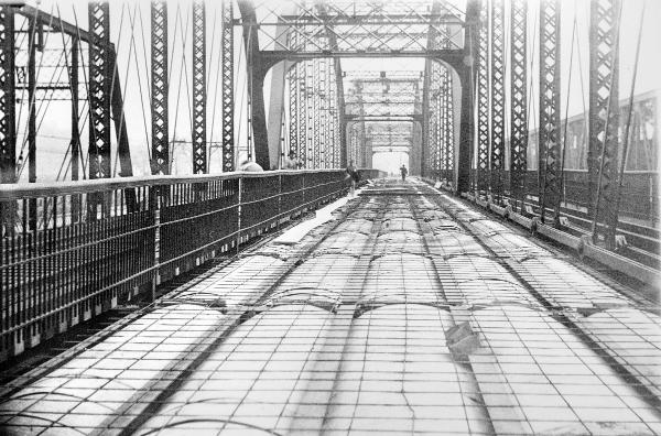 Historic photo of the nearly complete highway bridge over the Great Miami River