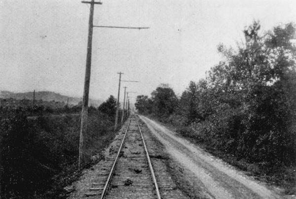Historic photo of the CL&A captioned "A stretch of track near Simonson. Stop No. 123."