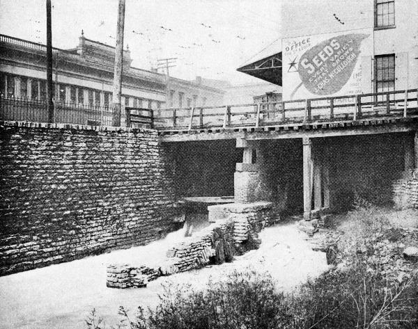 Historic photo of the Miami & Erie Canal mill race next to Eggleston Avenue from the previous photo