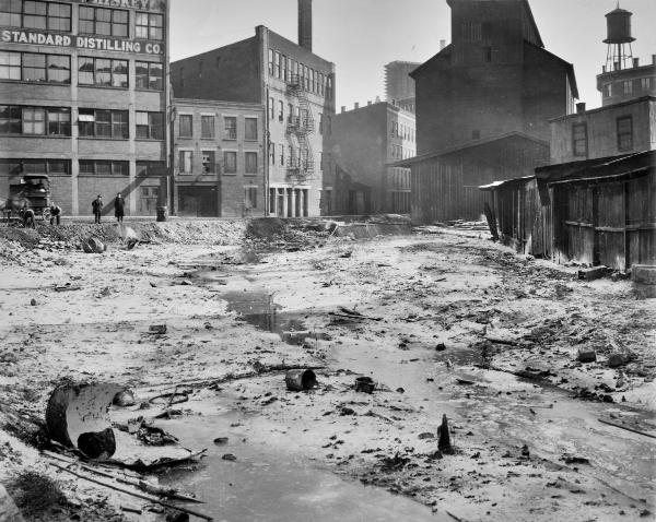 Historic photo of the Miami & Erie Canal Lockport basin at Cheapside Avenue after draining in 1919