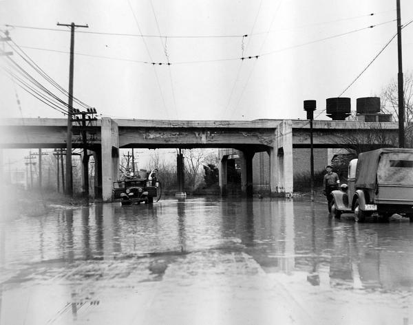 Historic photo of the subway overpass at Mitchell Avenue during the 1937 flood