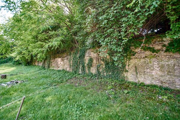 A recent view of the concrete wall from the previous historic photos