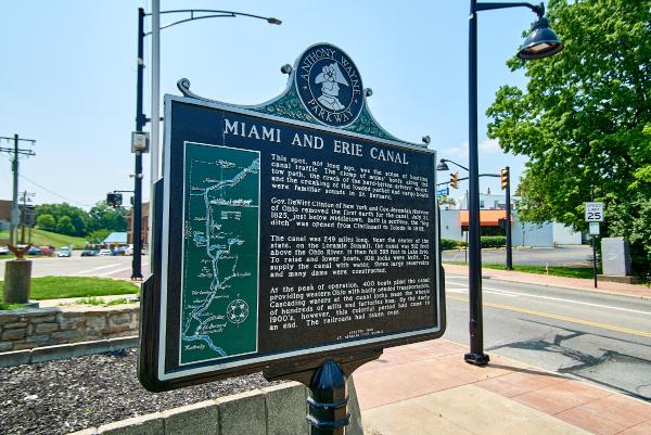 Miami & Erie Canal historical plaque at the St. Bernard municipal building