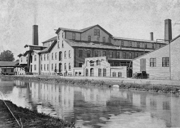 Historic photo of the Friend & Fox Paper Company in Lockland next to the Miami & Erie Canal in approximately 1880