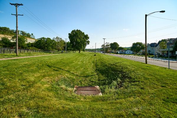 The end of the Miami & Erie Canal trench near the entrance to Miamisburg Community Park