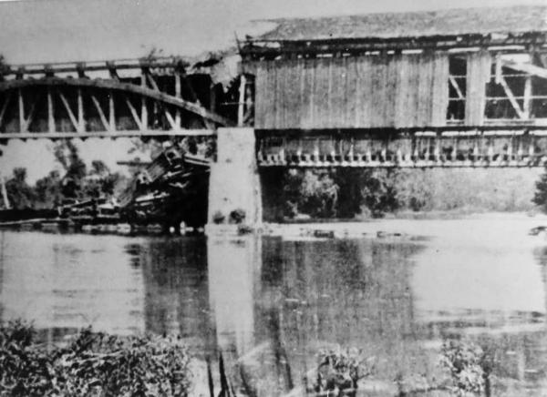 Historic photo of the derelict Miami & Erie Canal Taylorsville aqueduct over the Great Miami River in 1909