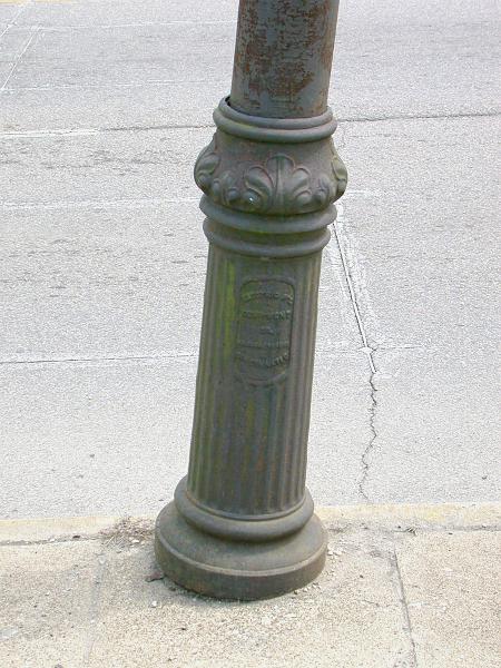 Detail of the decorative base on the trolley pole near the old B&O station in St. Bernard