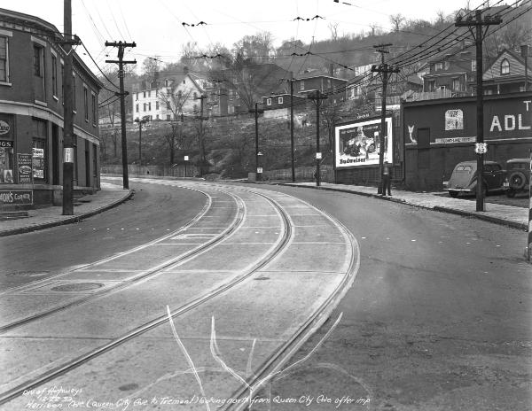Historic photo of streetcar tracks starting the long climb up Harrison Avenue in South Fairmount, with the Cincinnati & Westwood's tracks on the hill above